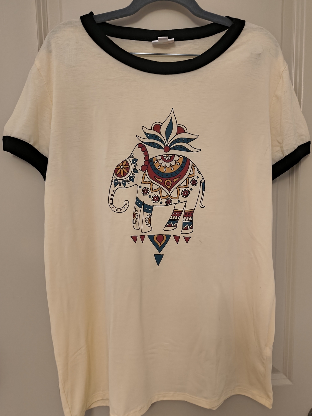 LuLaRoe Cream Tee with Black Trim and Colorful Elephant Graphic